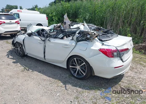 2023 Honda Civic Touring z USA, uszkodzony, nr VIN 2HGFE1F97PH313478